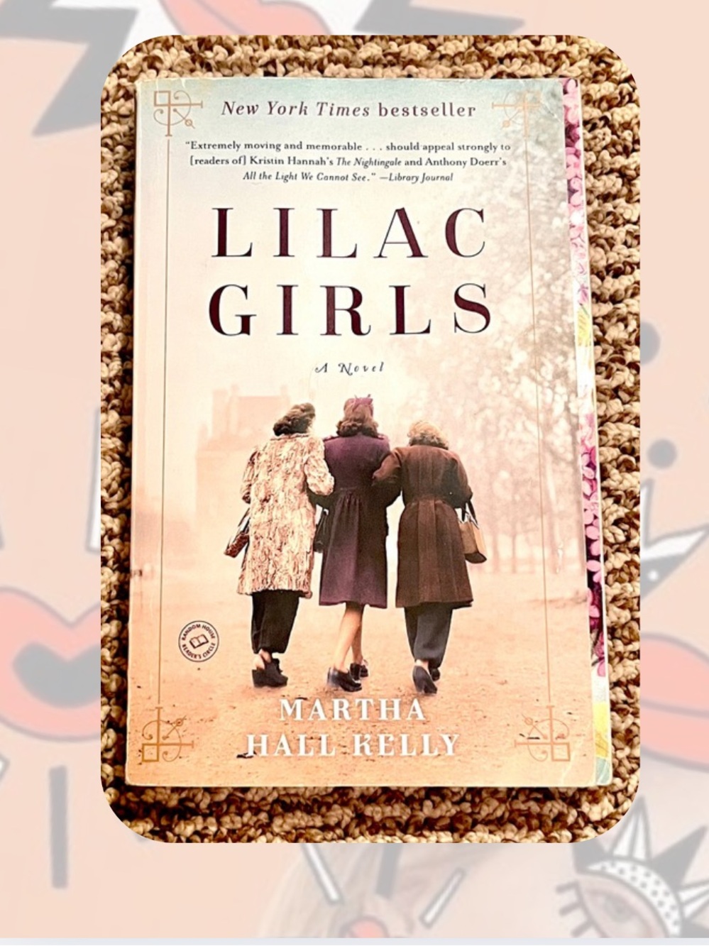 Lilac Girls by Martha Hall Kelly - Paperback Novel in Lilac and Cream
